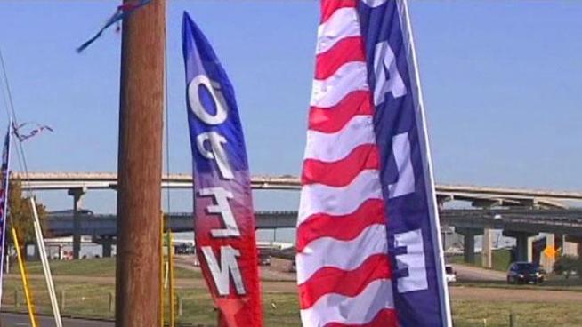 Mesquite is taking steps to make it easier for businesses to be seen, but some store owners say the city's new movable sign ordinance if flawed.