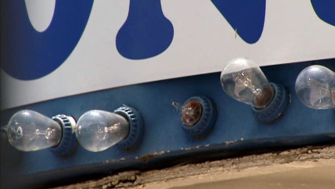 Crews continue to repair storm damage in Dallas, including at Fair Park, where hail damaged bulbs and booths at the midway.