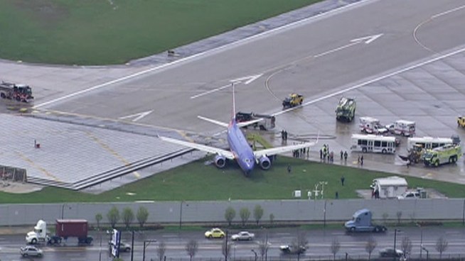 Southwest Flight 1919 was landing in Chicago from Denver Tuesday afternoon when it slid off the runoff and got stuck in the mud.
