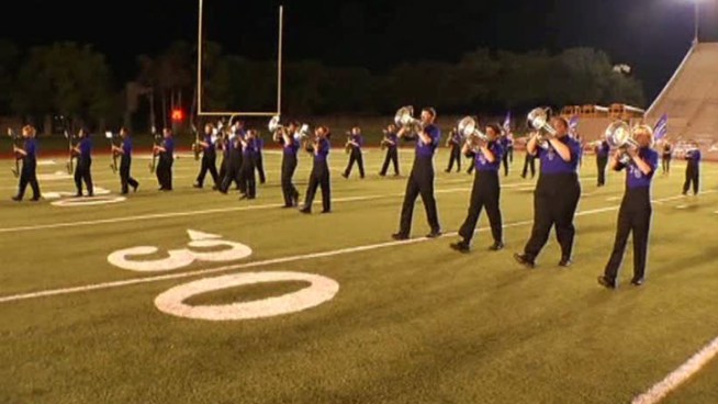 Paschal High School's marching band honored Rick Sek, a French horn player who died last week during a band party, during its halftime show.