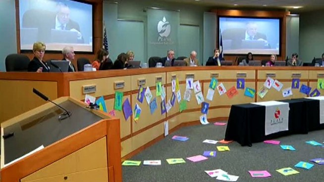 The Plano ISD approves layoffs of administrative and clerical staff in expectation of less state money.