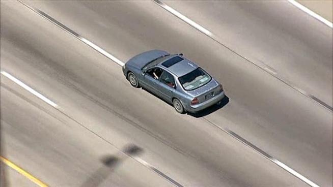 A mother led police on a chase in a car with her two children through several counties.