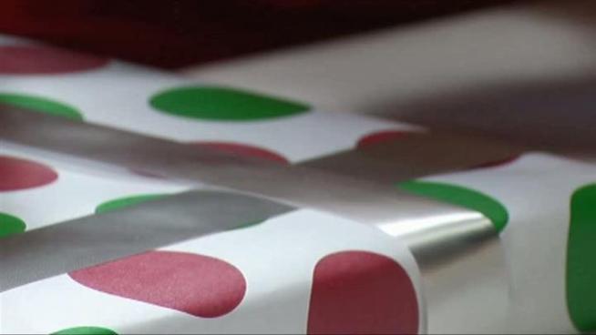Members of First Baptist Church in Wylie wrap presents for community members for free.