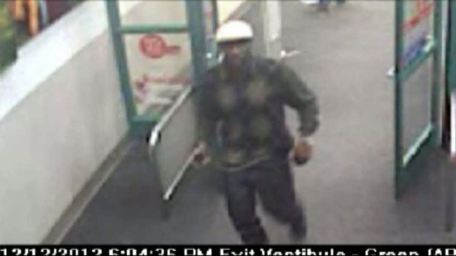 Police have released surveillance images of a man who tried to use a credit card stolen from a woman while she picking up her child at a Coppell day care.