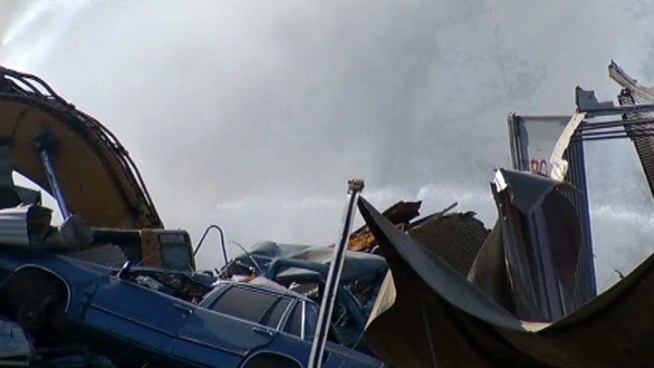 Cars at a Greenville recycling facility caught fire Thursday.