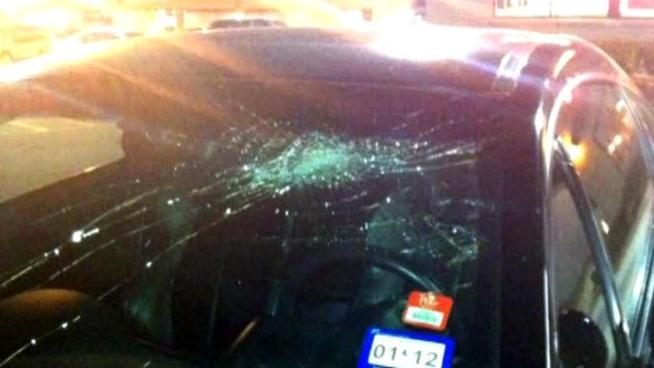 A Plano woman says another driver jumped out of his vehicle and pounded on her windshield after she honked at him.