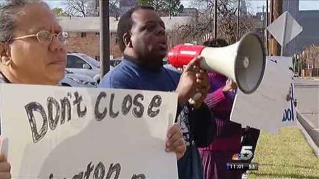Parents and community members rally together to protest Dallas ISD's potential consolidation of nine elementary and two middle schools.