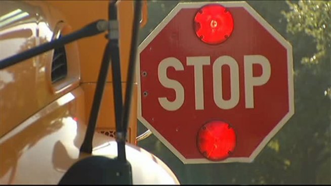 Arlington Police hitched a ride on a district school bus Tuesday morning to find and ticket drivers not stopping for school buses.