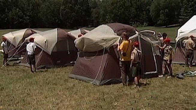The Irving-based Scouts have agreed to review a proposal that would allow individual units to accept gays as adult leaders, but a spokesman says there's no expectation that the ban on gay leaders will be lifted any time soon.