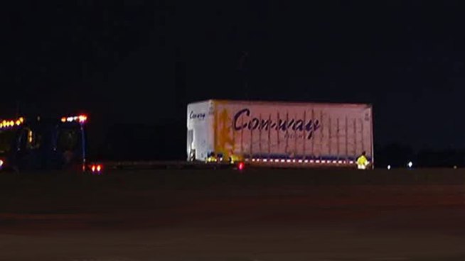 According to police, around 2:30 a.m., a truck hauling two trailers was heading southbound on I-45 near Dowdy Ferry Road when the rear trailer flipped and landed on its side spilling paint on the roadway.