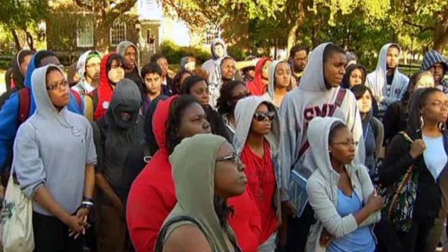 SMU students, faculty and staff members wearing hoodies walked quietly across campus in support of Trayvon Martin.