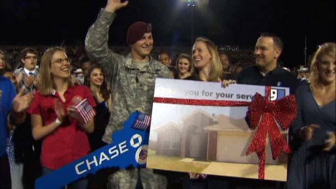 A veteran who was injured in Afghanistan and his family have received a new, mortgage-free home.