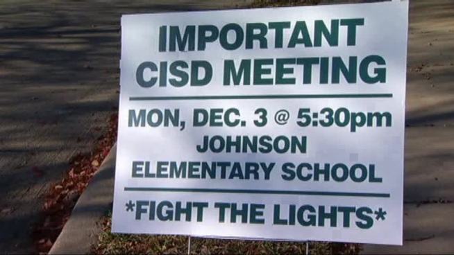 A Southlake neighborhood is fighting a possible plan by the Carroll ISD to install lights at baseball and softball fields at Carroll Senior High School.