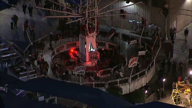 This raw video shows the lowering to the ground of the 24 riders who were stranded on the Stratosphere at the State Fair of Texas when the ride lost power late Friday night.