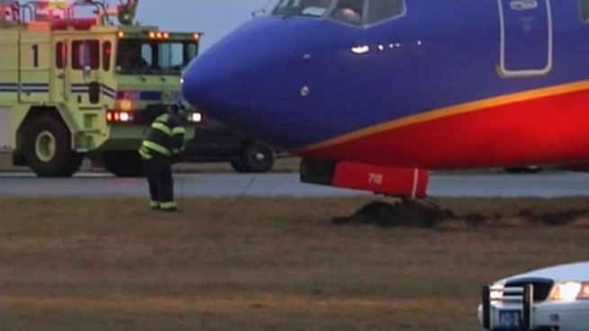 Southwest Airlines Flight 4695 bound for Tampa veered off the taxiway at New York's Long Island MacArthur Airport and ended up stuck in the mud.