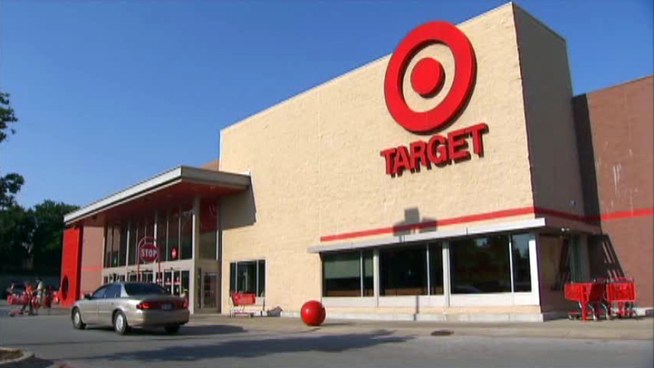 Dallas police say a 30-year-old man unwrapped a butcher knife inside a Target store, chased down a random shopper and stabbed her.