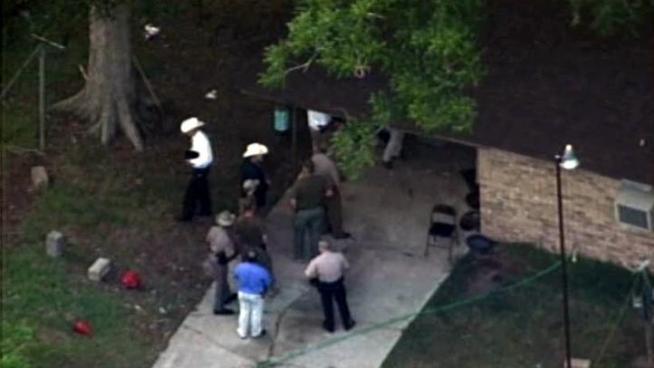 Liberty County officials say no bodies were found at a rural home after a tip from a psychic.