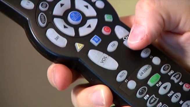 Time Warner Cable is investigating a complaint that a cartoon two children were watching suddenly changed to a pornographic movie.