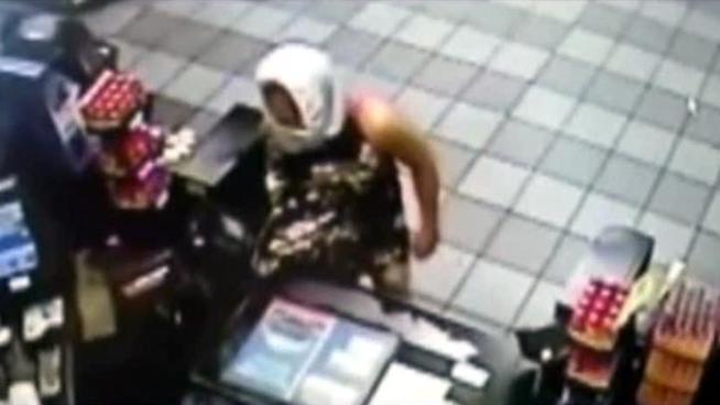 Police say a cross-dressing robber wearing underwear for a mask held up a Dallas gas station.