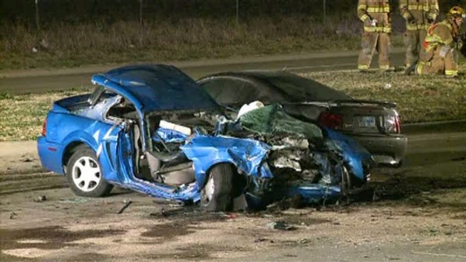 Two men believed to be street racing crash into a streetsweeper, killing one of the occupants.