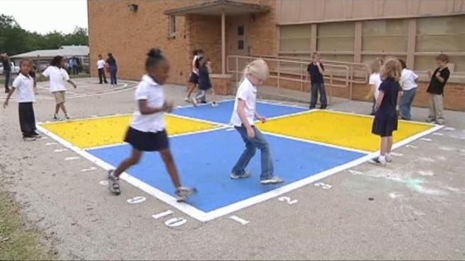 Kindergarten teacher Beverly Gavrel has employed a company called Peaceful Playgrounds to improve the place children play at Phillips Elementary school.