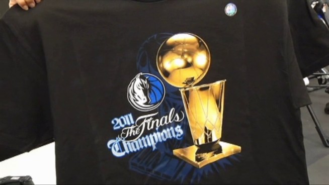 Mavs fans flock to stores to get their hands on championship gear.