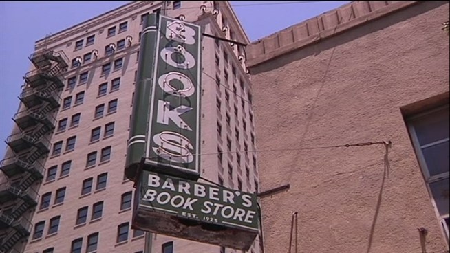 Fort Worth collector now stashes his nearly 50,000 books in his former bookstore.