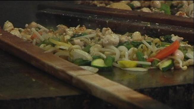 Culinary adventure and attitude collide through Mongolian stir-fry at Genghis Grill.