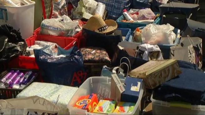 Police arrested four people Sunday suspected of running a massive shoplifting ring and reselling items at local flea markets.