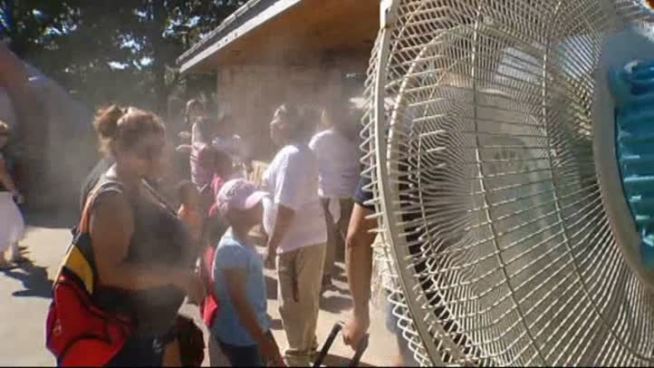 The Dallas Zoo is helping visitors stay cool in extreme heat during dollar days.
