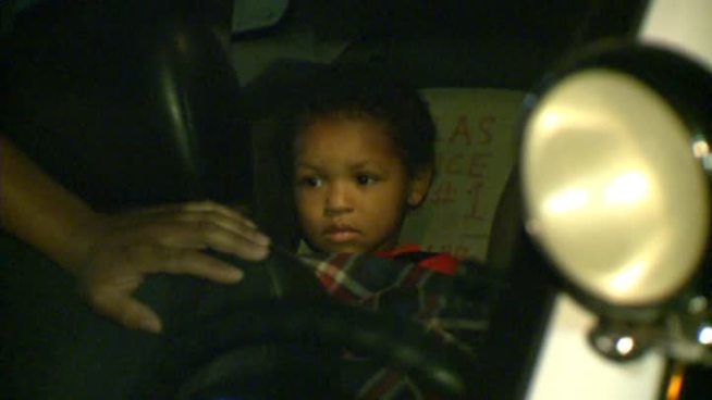 Dallas police say the parents of a child who was found wandering around a hotel have been found.