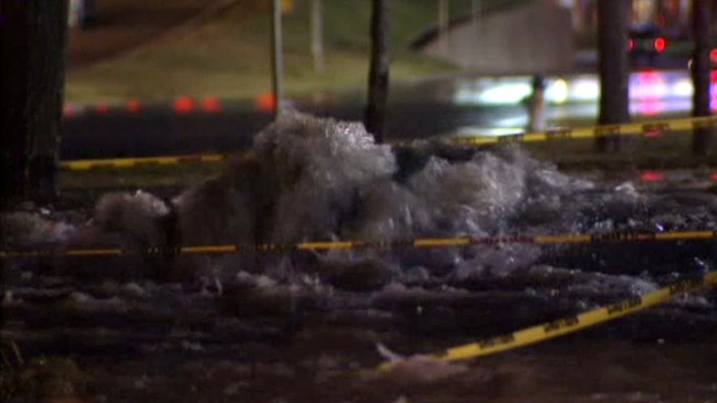 The northbound Interstate 35E service road was covered in water after a 36-inch diameter water pipe failed during rush hour, stranding drivers for hours.