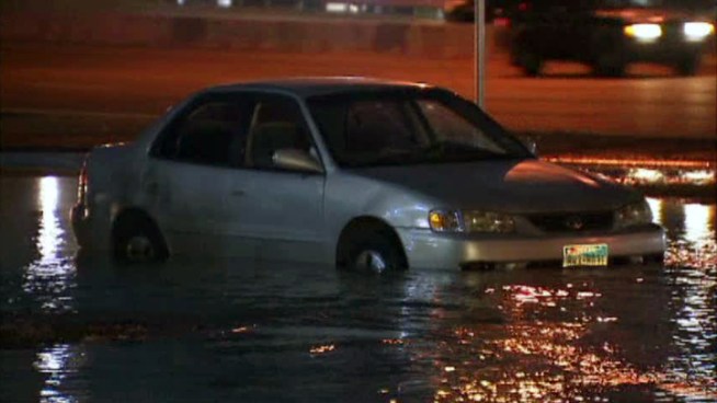 Crews were repairing a water main break that flooded an Interstate 35 service road in Dallas.