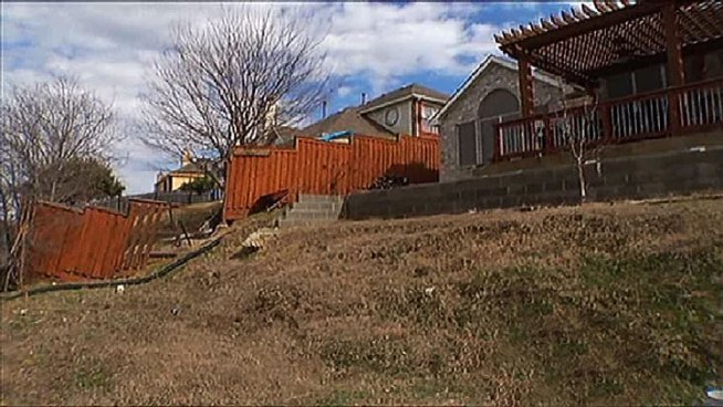 More than a dozen homeowners in Carrollton are suing the city because they say the backyard on their property are sinking.