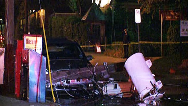 A utility transformer and pole fell on a car on Boll Street in Uptown Friday morning, smashing the car and leaving crews puzzled. No one was injured.