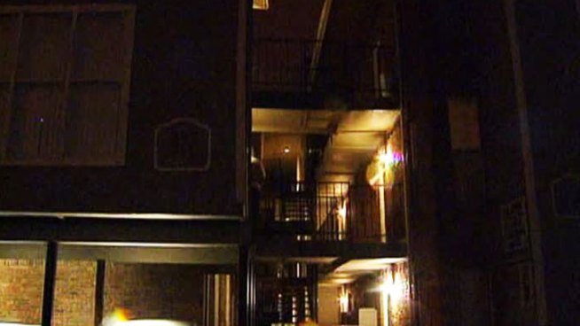 Police say a homeowner shot and killed an armed intruder who tried to break into a third floor apartment in North Dallas Wednesday night.