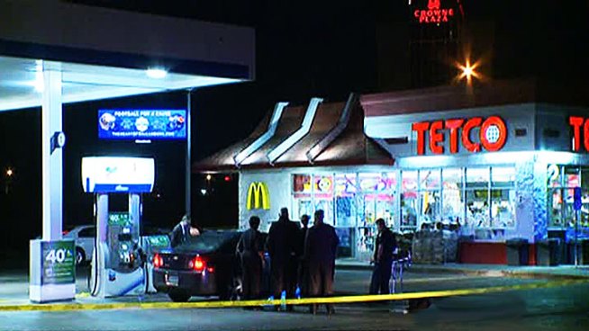 Officers found a man dead with a gunshot wound to the head and another man shot in the leg Tuesday night. Both men were inside a vehicle at a gas station on West Mockingbird Lane, off state Highway 183.
