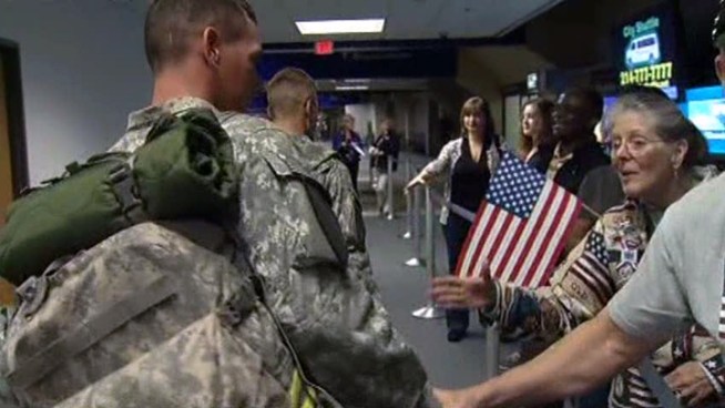 Airport staff and volunteers say they will miss welcoming troops home when DFW Airport's R&R program ends in March.