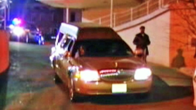 The gold-colored hearse carrying the body of music icon Whitney Houston arrived at the Whigham Funeral Home in Newark.