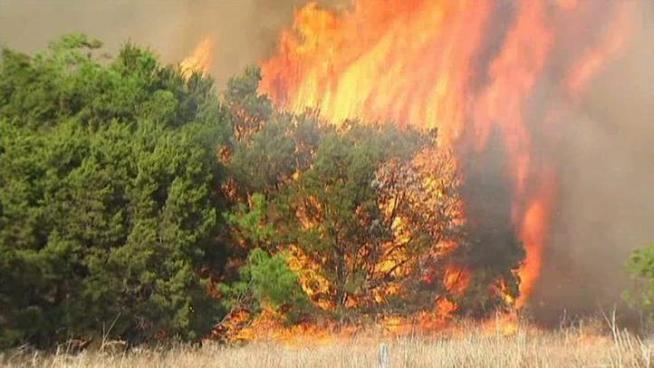 Gov. Rick Perry says Texans were burned by Washington after the federal government rejects a request to declare nearly all of the state a major disaster because of wildfires.