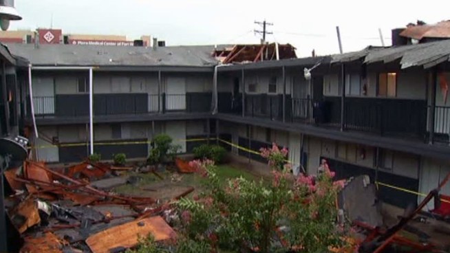 As storms dumped rain and hail on North Texas, heavy winds blew off the roof of a two-story apartment complex in Fort Worth. No one was injured.