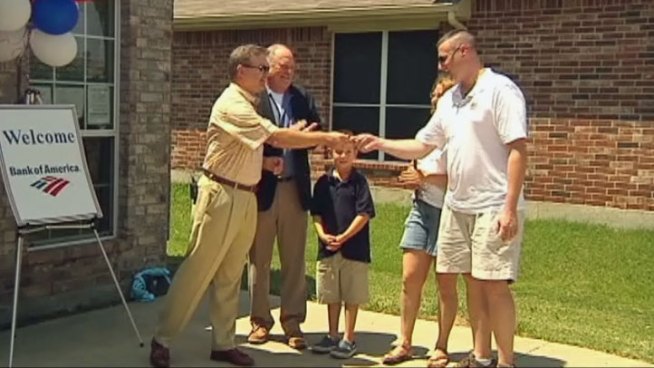Wounded soldier Sgt. Kevin Bowden was handed the keys to a new home paid for by the Military Warriors Support Foundation and Bank of America.