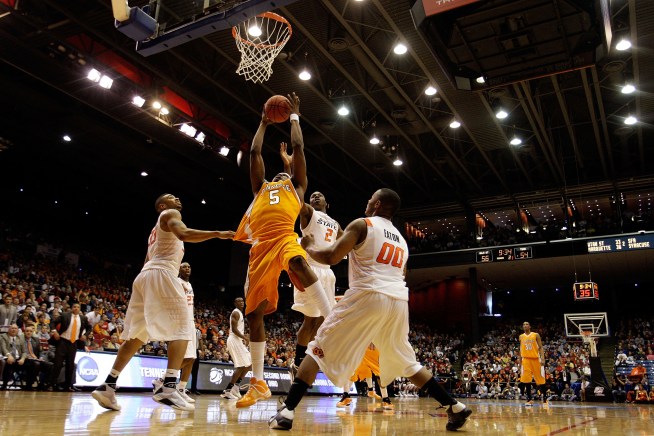 Eaton Leads Cowboys to 77-75 Victory