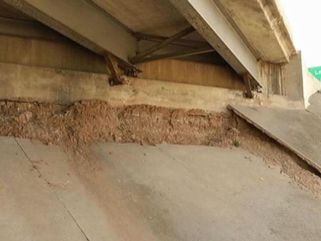 Thousands of people drive over the I-35E North overpass at Highway 77 in <a title=