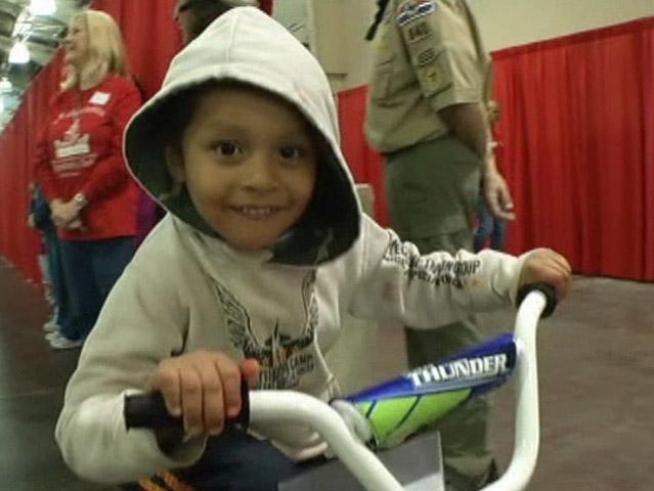 This year's Christmas in the Park brought out a record 20,000 people who received toys, bikes, groceries and other items for the holiday.