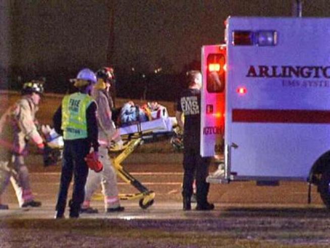 Seven people were injured when a sport utility vehicle rolled over and came to rest in an Arlington shopping center parking lot.
