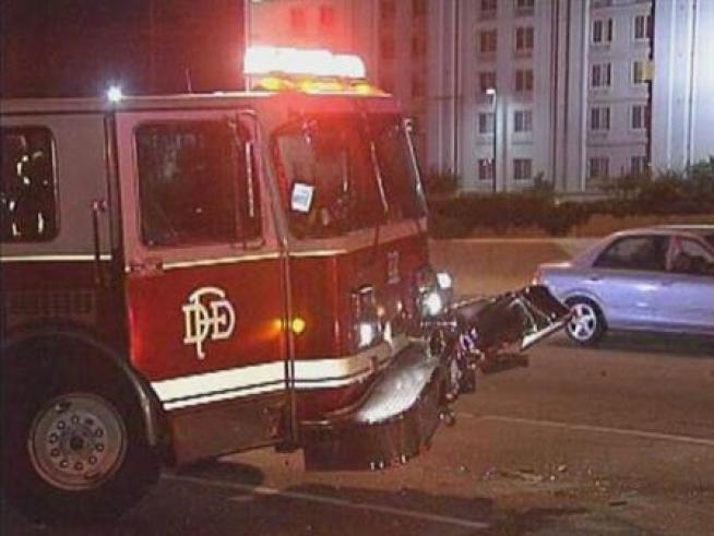 A Dallas Fire-Rescue truck was hit by a car while helping Dallas police at an accident scene on 75 and Walnut Hill Lane.