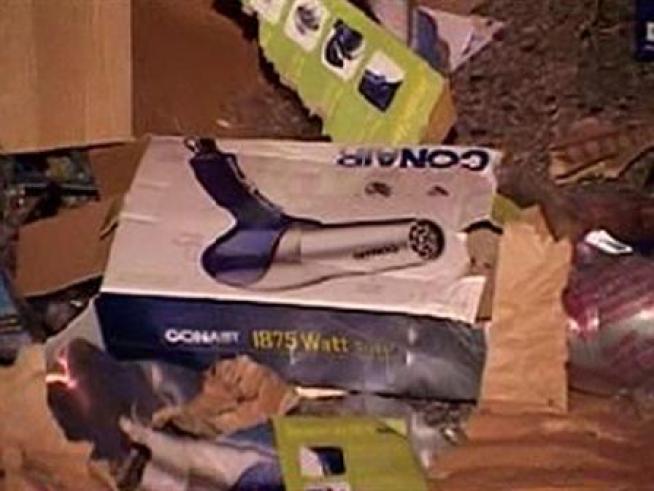 Traffic got tangled after an accident involving a trailer loaded with curling irons and blow dryers.