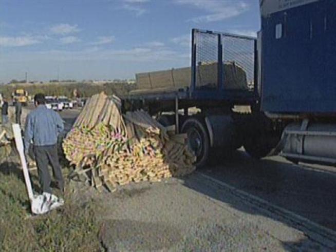 Traffic on I-30 eastbound and westbound was backed up Friday morning because a tractor-trailer hauling lumber lost its load.