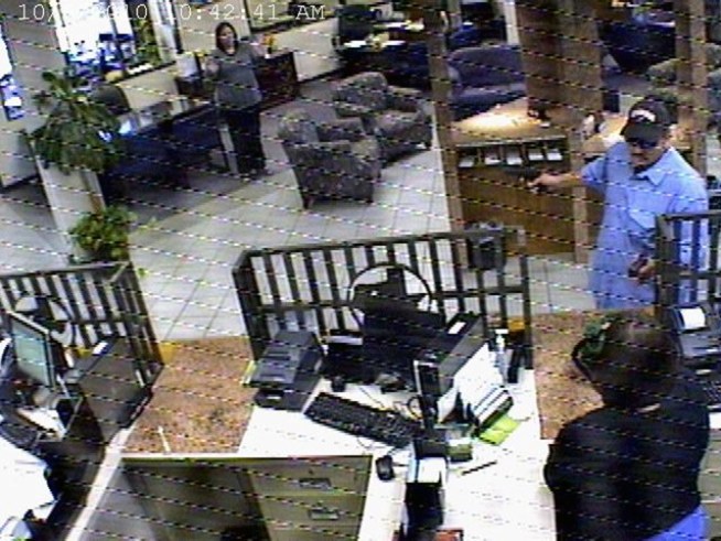 A man armed with a pistol in each hand shot up a Fort Worth bank before making an unusual getaway, police said.